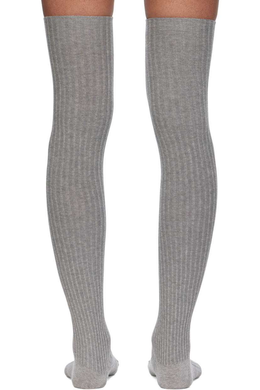 Two pairs of thigh-high rib-knit stretch organic cotton-blend socks.

Supplier color: Black/Grey