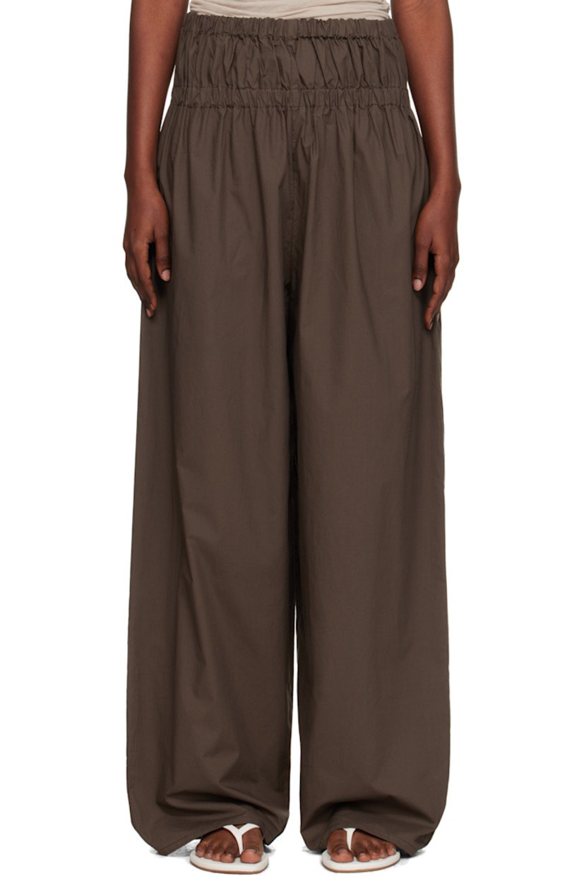 Organic cotton poplin lounge pants.

· GOTS-, OEKO-TEX®-, and OCS 100-certified
· Ruching at elasticized waistband
· Two-pocket styling

Supplier color: Mara brown