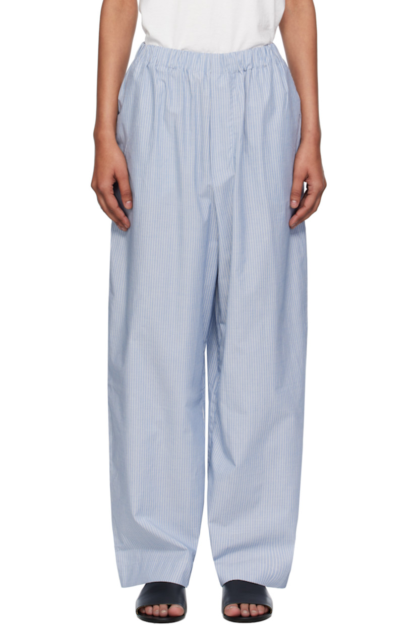 Organic cotton poplin lounge pants.

· Certified GOTS, OEKO-TEX®, and OCS 100
· Stripes throughout 
· Elasticized waistband
· Two-pocket styling
· Mock fly 

Supplier color: Blue stripe