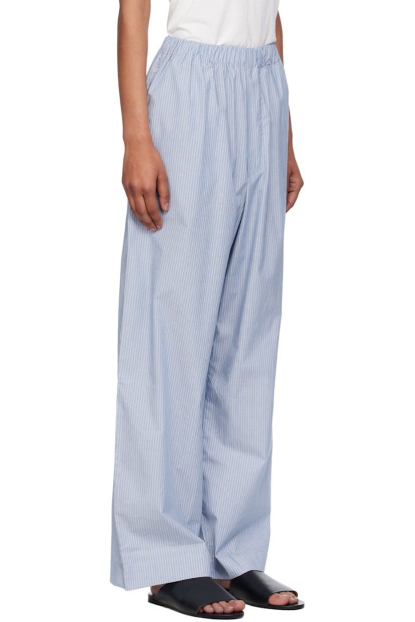 Organic cotton poplin lounge pants.

· Certified GOTS, OEKO-TEX®, and OCS 100
· Stripes throughout 
· Elasticized waistband
· Two-pocket styling
· Mock fly 

Supplier color: Blue stripe