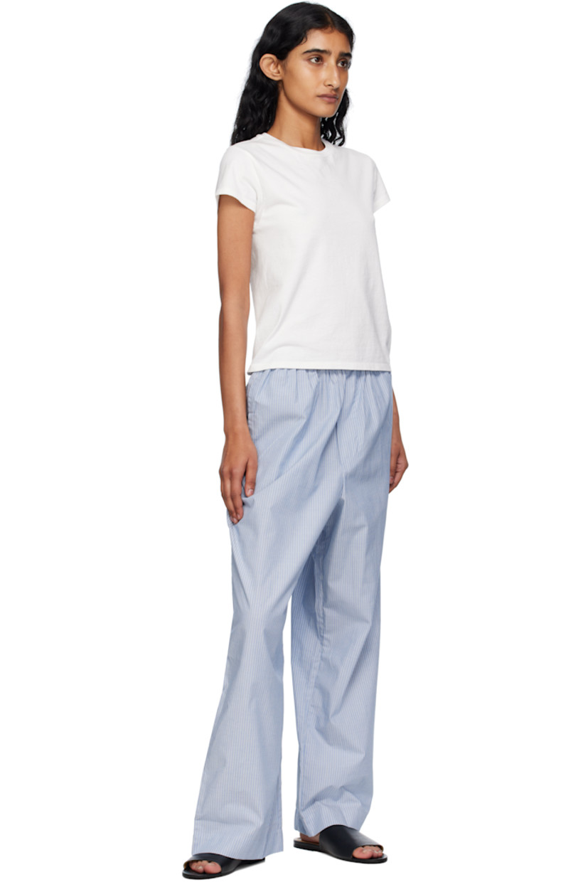 Organic cotton poplin lounge pants.

· Certified GOTS, OEKO-TEX®, and OCS 100
· Stripes throughout 
· Elasticized waistband
· Two-pocket styling
· Mock fly 

Supplier color: Blue stripe