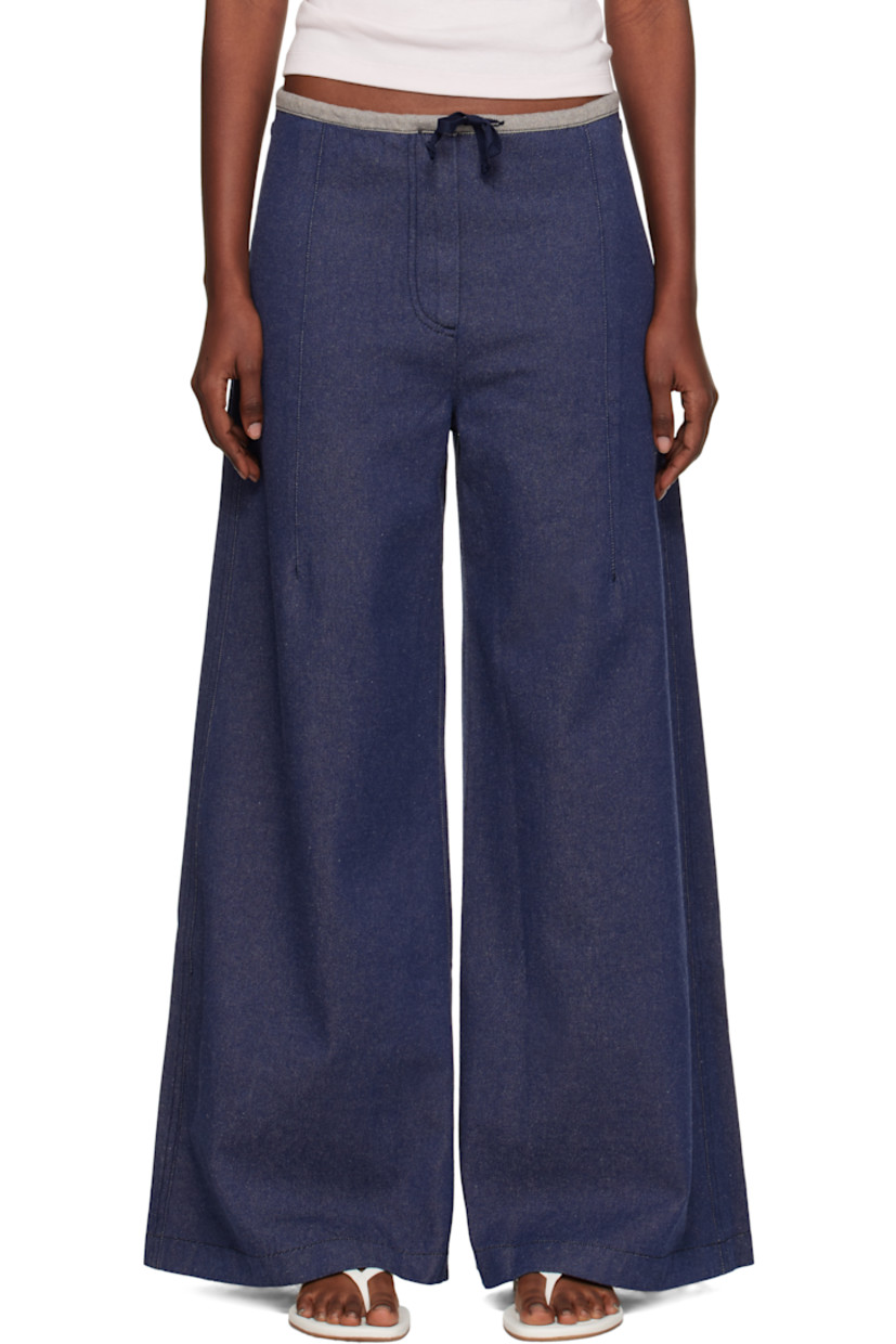 Non-stretch recycled cotton-blend denim jeans. 

· GRS- and OEKO-TEX®-certified
· Drawstring at waistband
· Darts at front
· Two-pocket styling
· Zip fly

Supplier color: Recycled indigo