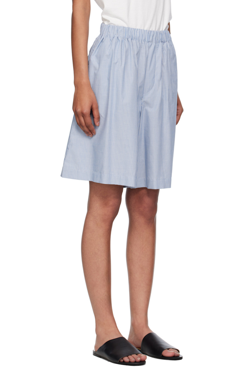Organic cotton poplin shorts.

· Certified GOTS, OEKO-TEX®, and OCS 100
· Striped throughout 
· Elasticized waistband
· Two-pocket styling
· Mock fly 

Supplier color: Blue stripe