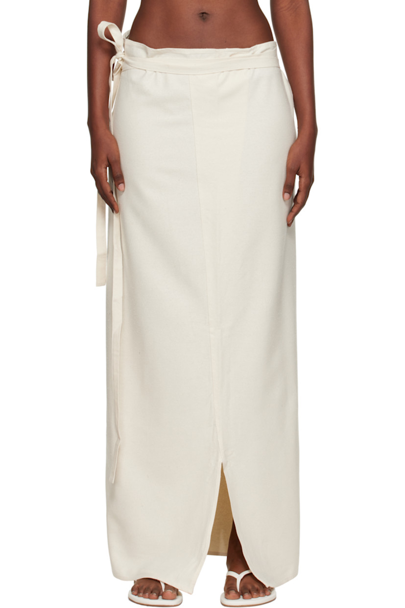 Wild silk noil maxi skirt.

· OEKO-TEX®-certified
· Wrap construction
· Self-tie closure at waist
· Slit at hem

Supplier color: Undyed