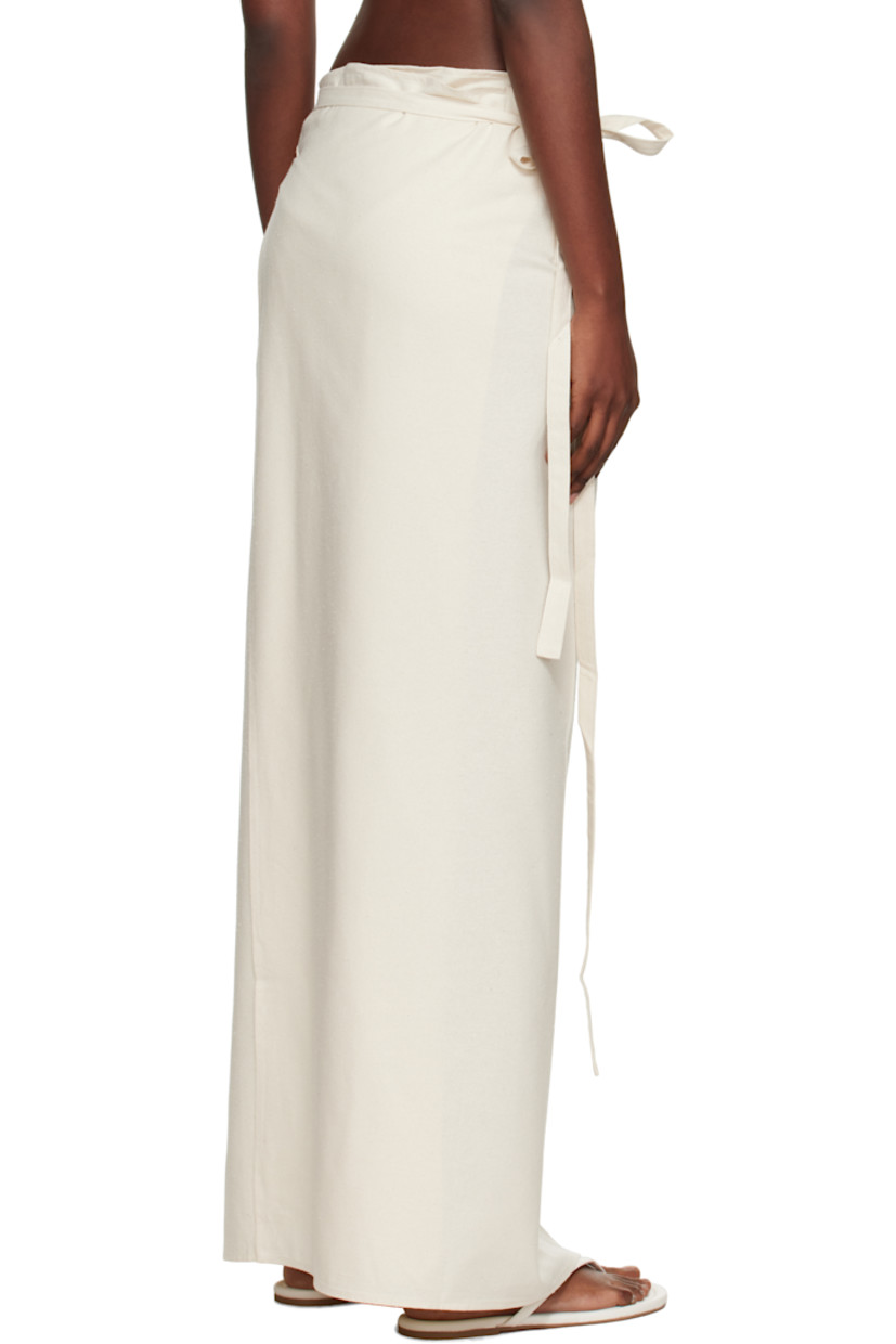 Wild silk noil maxi skirt.

· OEKO-TEX®-certified
· Wrap construction
· Self-tie closure at waist
· Slit at hem

Supplier color: Undyed