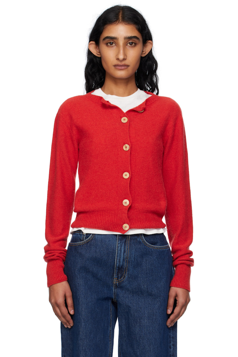 Purl-knit recycled cashmere- and wool-blend cardigan. 

· Rib-knit crewneck, hem, and cuffs
· Button closure 

Supplier color: Melograno red