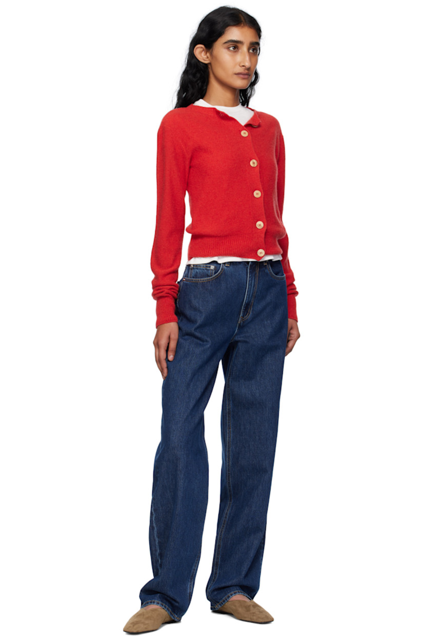 Purl-knit recycled cashmere- and wool-blend cardigan. 

· Rib-knit crewneck, hem, and cuffs
· Button closure 

Supplier color: Melograno red