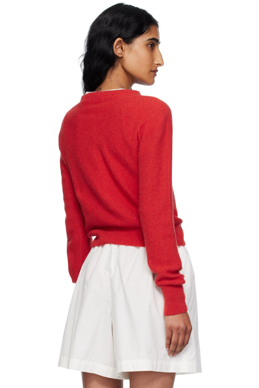 Purl-knit recycled cashmere- and wool-blend sweater. Rib-knit crewneck, hem, and cuffs.

Supplier color: Melograno red