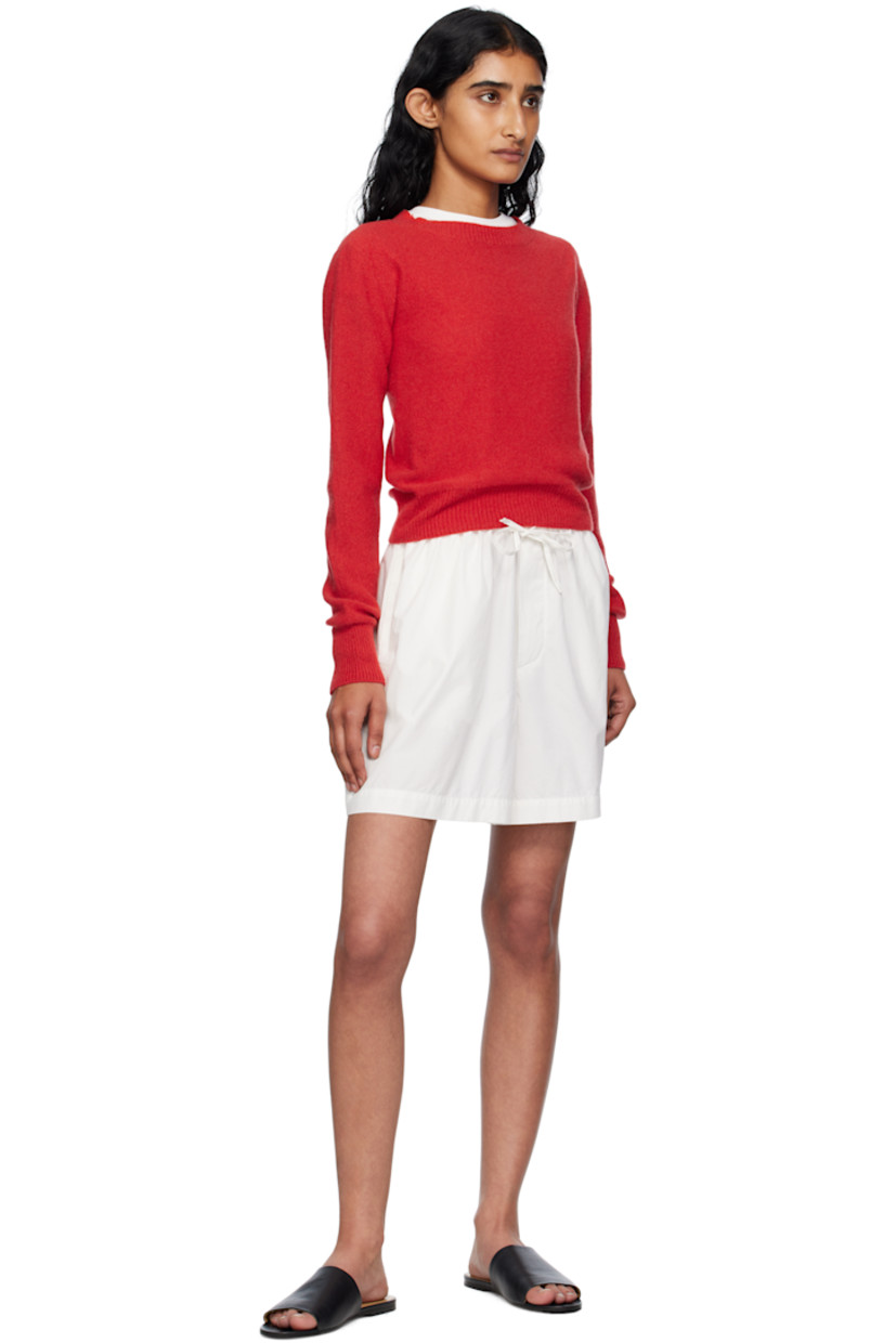 Purl-knit recycled cashmere- and wool-blend sweater. Rib-knit crewneck, hem, and cuffs.

Supplier color: Melograno red