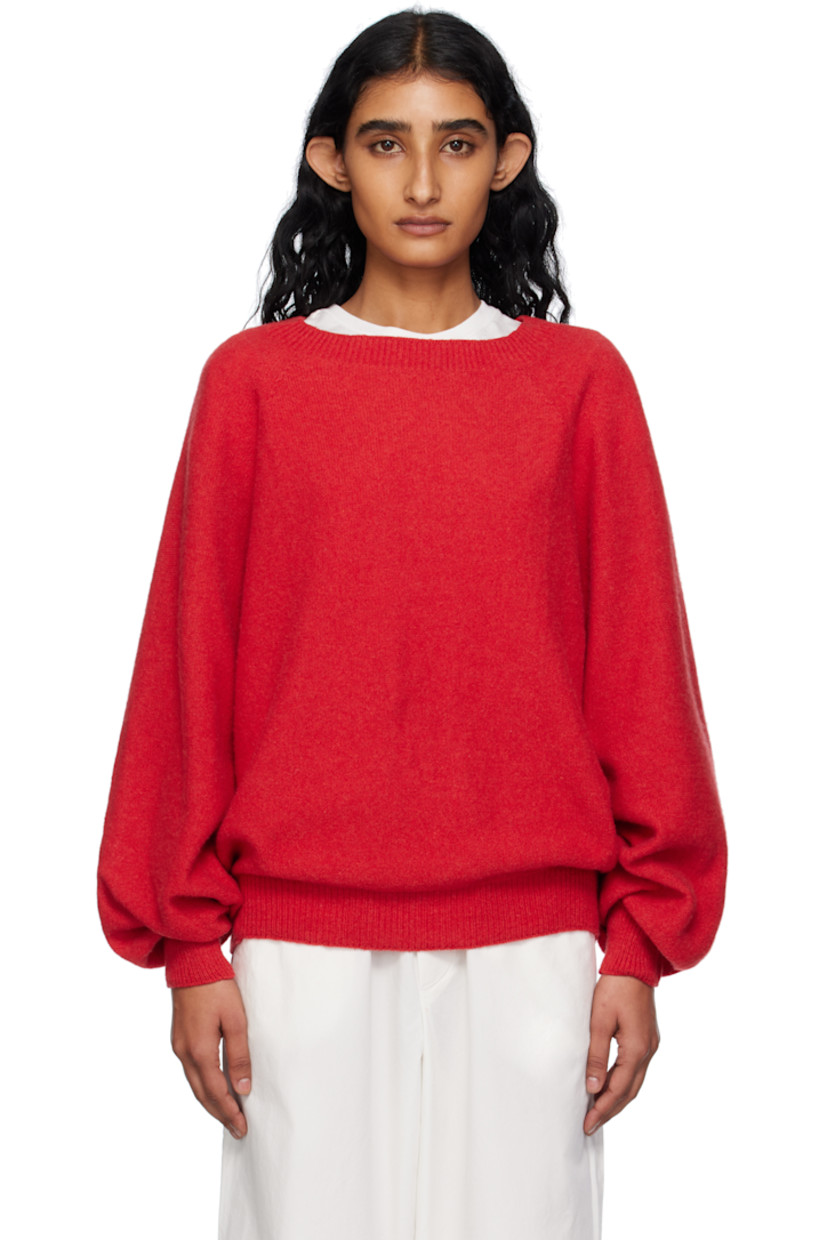 Purl-knit recycled cashmere- and wool-blend sweater. 

· Rib-knit crewneck, hem, and cuffs 
· Raglan sleeves 

Supplier color: Melograno red