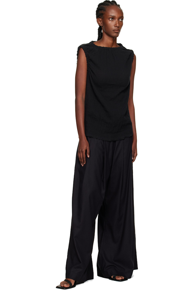 Crinkled linen- and organic cotton-blend hopsack top.

· OEKO-TEX®-certified
· Gathering at elasticized boatneck and armscyes

Supplier color: Black