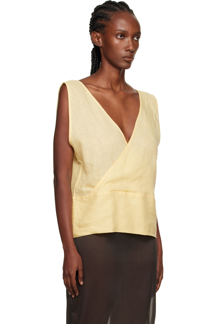 Bias-cut semi-sheer linen hopsack top. 

· OEKO-TEX®-certified
· Wrap construction
· V-neck
· Low back

Supplier color: Ana yellow
