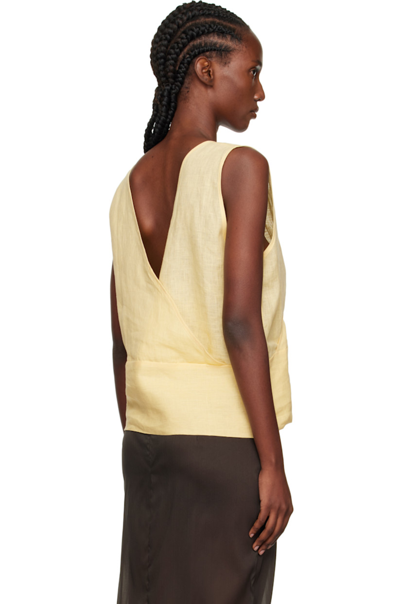 Bias-cut semi-sheer linen hopsack top. 

· OEKO-TEX®-certified
· Wrap construction
· V-neck
· Low back

Supplier color: Ana yellow