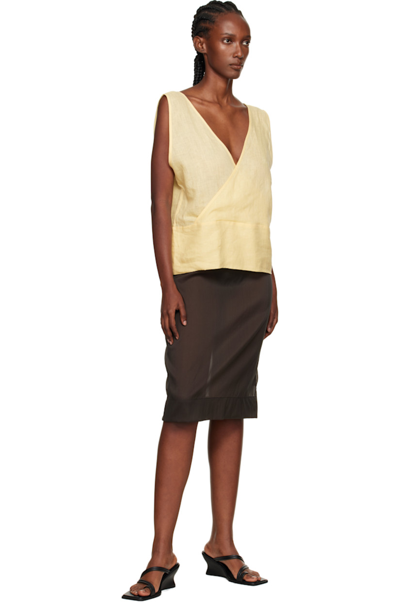 Bias-cut semi-sheer linen hopsack top. 

· OEKO-TEX®-certified
· Wrap construction
· V-neck
· Low back

Supplier color: Ana yellow
