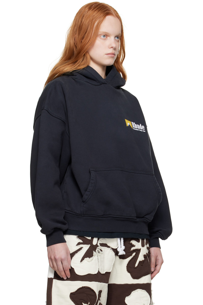 Cotton fleece hoodie. 

· Fading throughout 
· Logo, graphic, and text printed at chest 
· Kangaroo pocket
· Rib-knit hem and cuffs
· Dropped shoulders

Supplier color: Vintage black