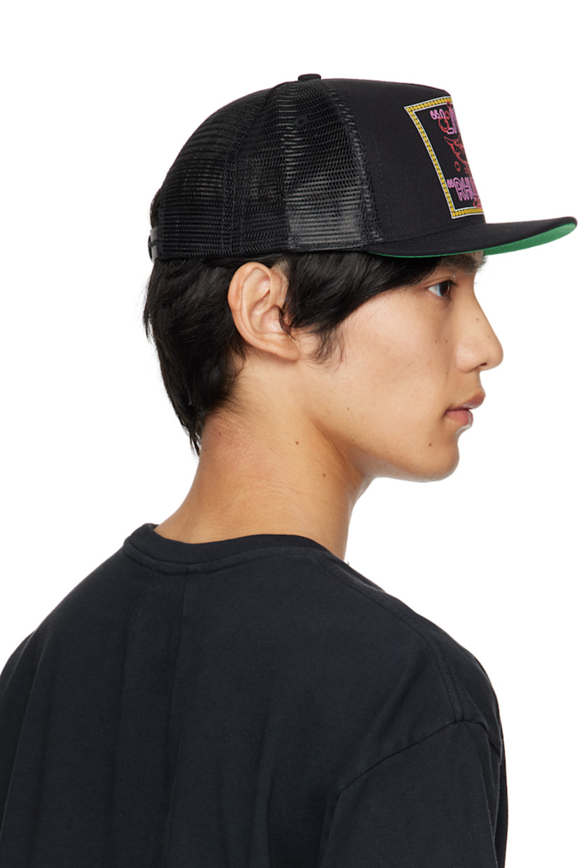 Paneled cotton twill and mesh cap.

· Embroidered eyelets at crown
· Graphic, logo, and text printed at face
· Flat brim 
· Snapback fastening at back
· Twill browband
· Plain-woven lining 

Supplier color: Black