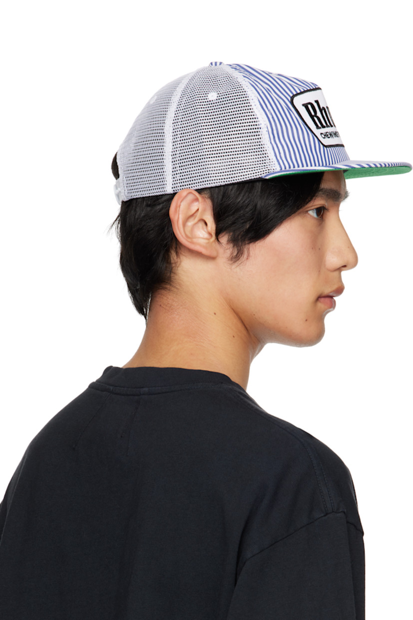 Paneled mesh and plain-woven cap. 

· Embroidered eyelets at crown 
· Stripes and embroidered logo patch at face
· Flat brim 
· Snapback fastening at back
· Twill browband
· Plain-woven lining 

Supplier color: Blue/White