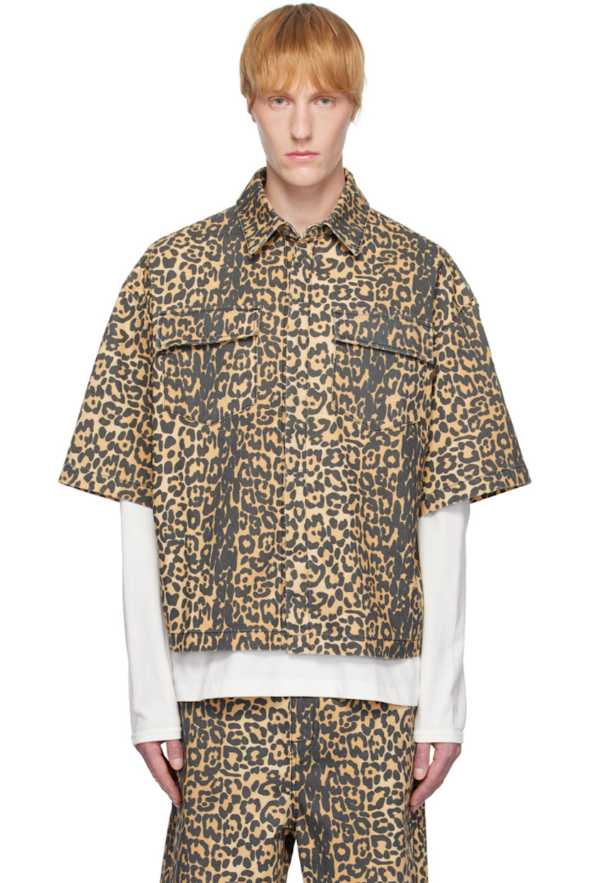 Boxy-fit non-stretch denim shirt. Leopard patten printed throughout. 

· Spread collar
· Concealed button closure
· Flap pockets
· Dropped shoulders

Supplier color: Black/Tan
