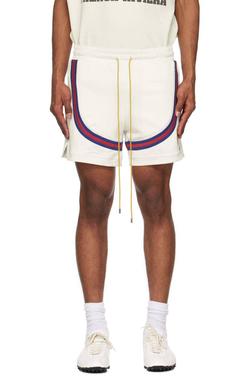 Double-layered cotton-blend jersey shorts. 

· Drawstring at elasticized waistband
· Two-pocket styling
· Stripe appliqués at  front and back
· Logo embroidered at front
· Vented cuffs

Supplier color: Off white/Navy/Red