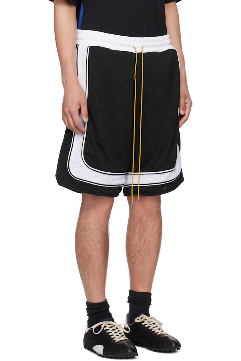 Double-faced polyester mesh shorts. 

· Drawstring at elasticized waistband
· Four-pocket styling
· Piping and vent at outseams 

Supplier color: Black/White