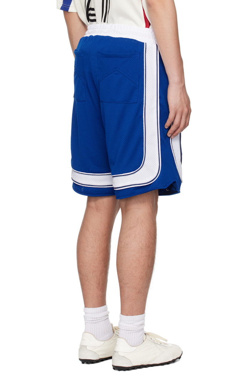 Double-faced polyester mesh shorts. 

· Drawstring at elasticized waistband
· Four-pocket styling
· Piping and vent at outseams 

Supplier color: Blue/White