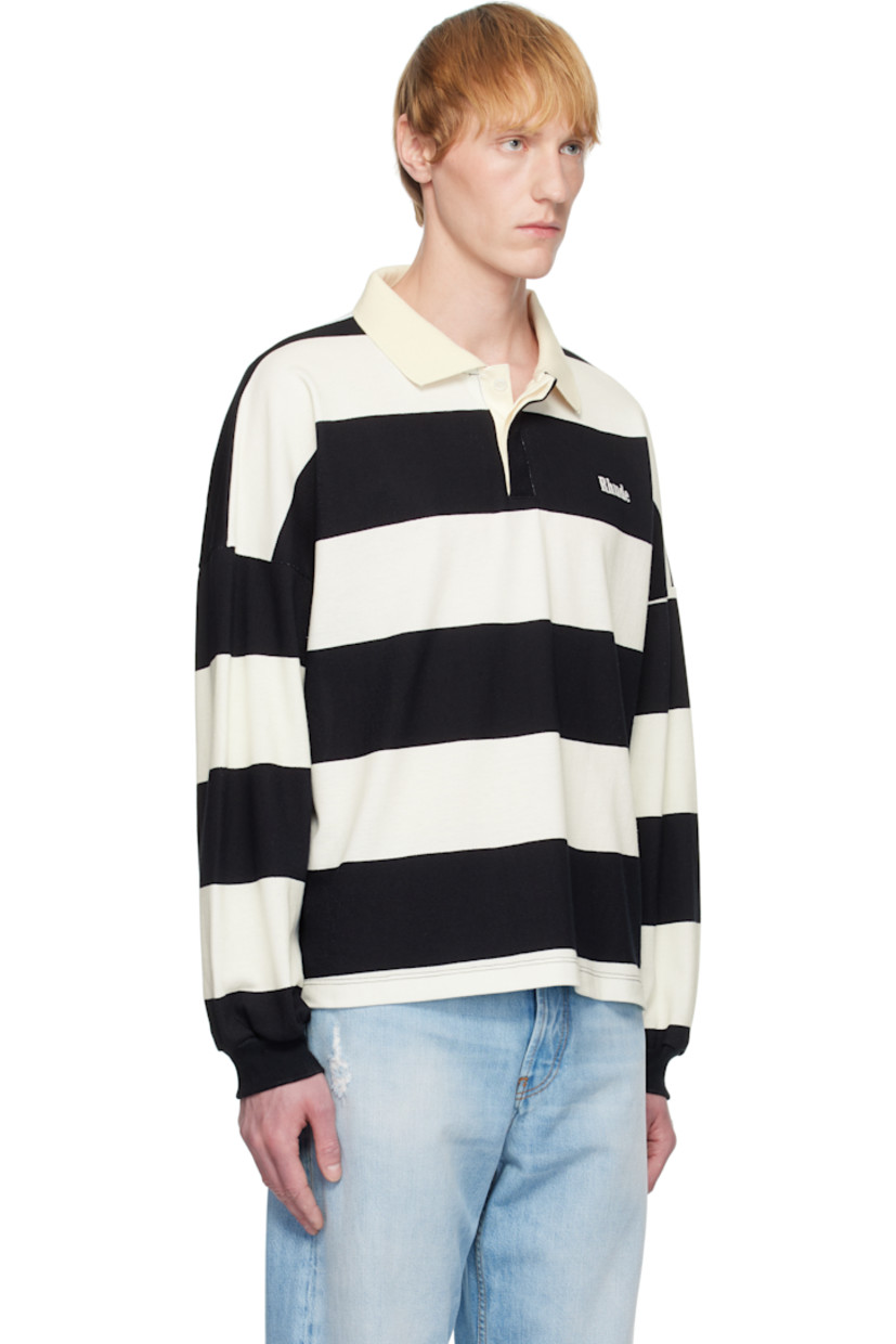 Cotton piqué polo. Stripes throughout. 

· Rib-knit spread collar and cuffs
· Concealed three-button placket
· Logo embroidered at chest
· Tennis-tail hem
· Dropped shoulders

Supplier color: White/Black