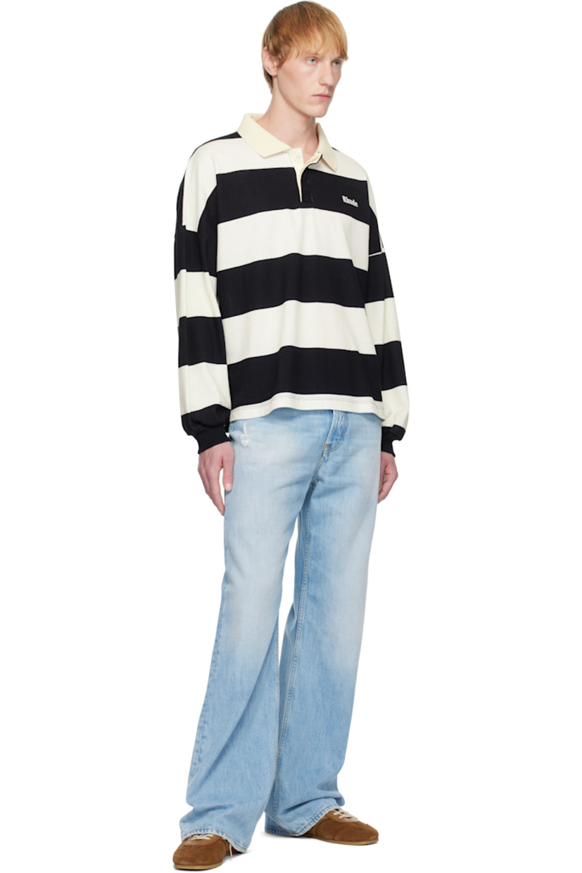 Cotton piqué polo. Stripes throughout. 

· Rib-knit spread collar and cuffs
· Concealed three-button placket
· Logo embroidered at chest
· Tennis-tail hem
· Dropped shoulders

Supplier color: White/Black