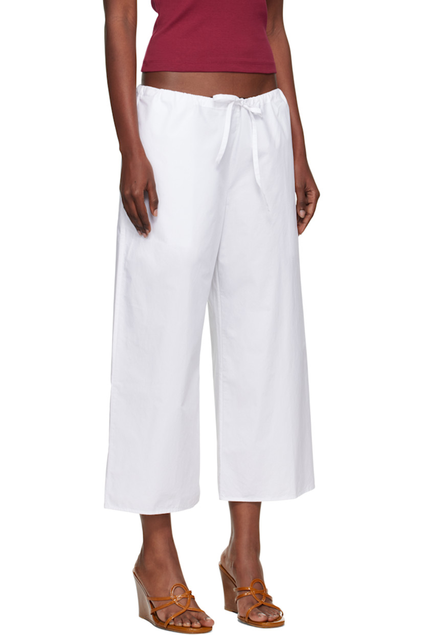 Handcrafted organic cotton poplin lounge pants.

· Wide-leg
· Drawstring at waistband
· Two-pocket styling

Supplier color: White