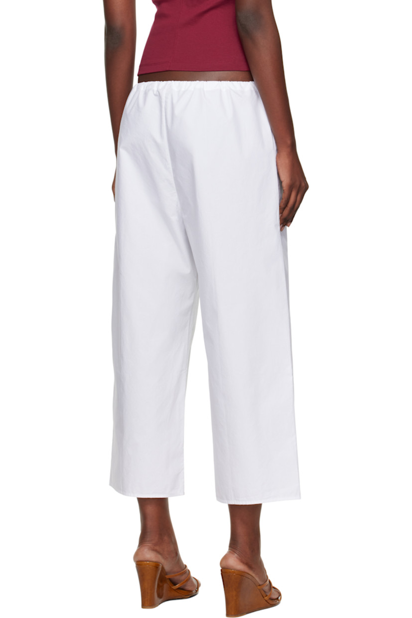 Handcrafted organic cotton poplin lounge pants.

· Wide-leg
· Drawstring at waistband
· Two-pocket styling

Supplier color: White