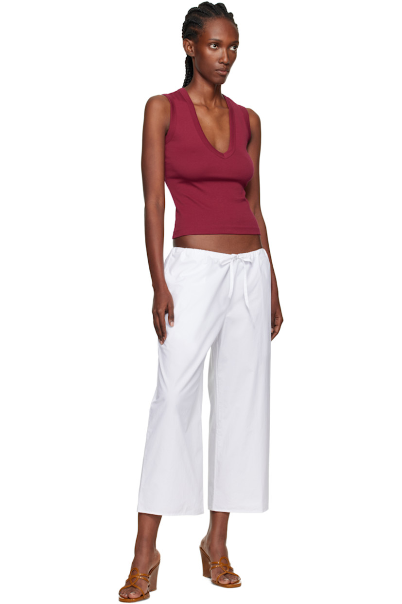 Handcrafted organic cotton poplin lounge pants.

· Wide-leg
· Drawstring at waistband
· Two-pocket styling

Supplier color: White