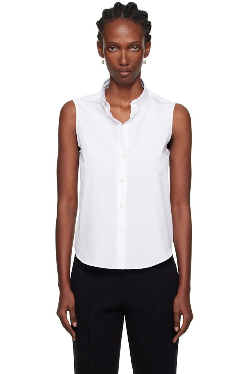 Handcrafted organic cotton poplin shirt.

· Spread collar
· Button closure
· Shirttail hem
· Mother-of-pearl hardware

Supplier color: White