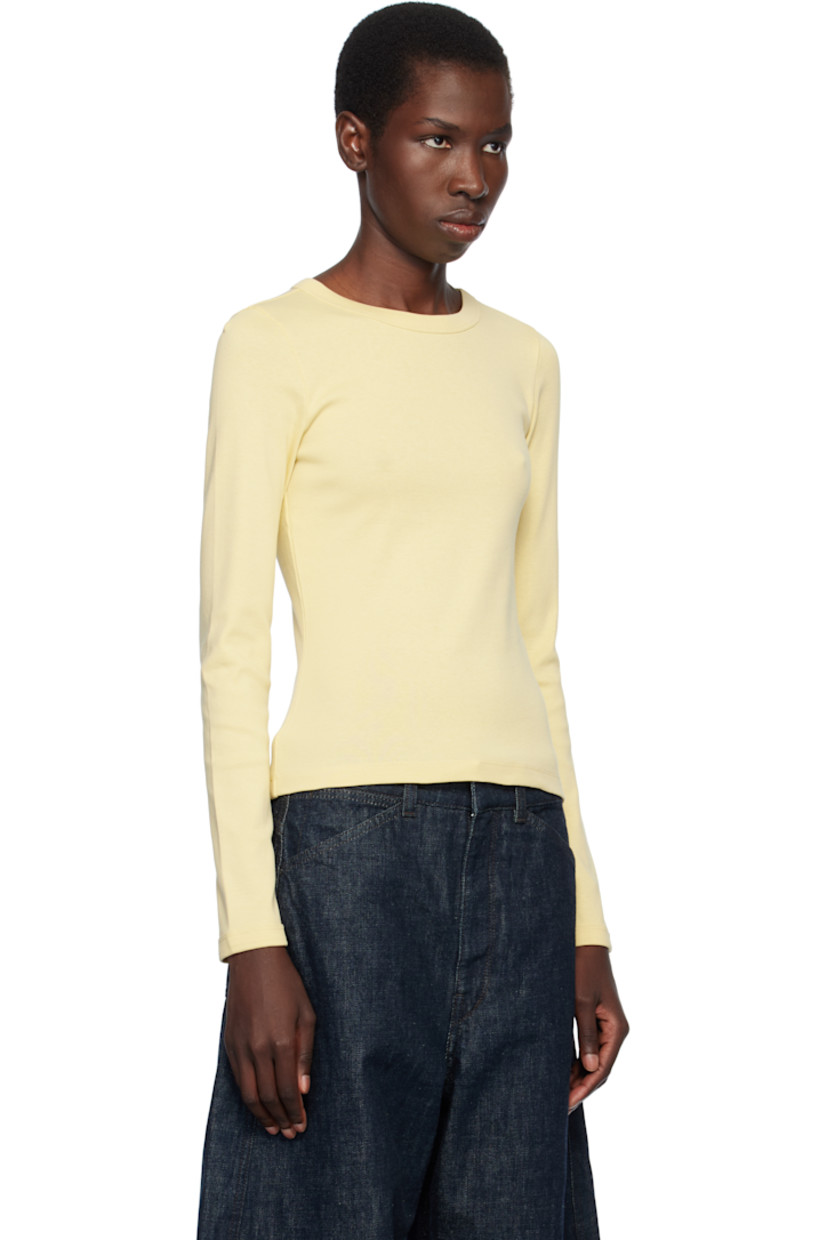 Organic cotton jersey T-shirt.

· Rib-knit crewneck and cuffs
· Central seam at back

Supplier color: Butter