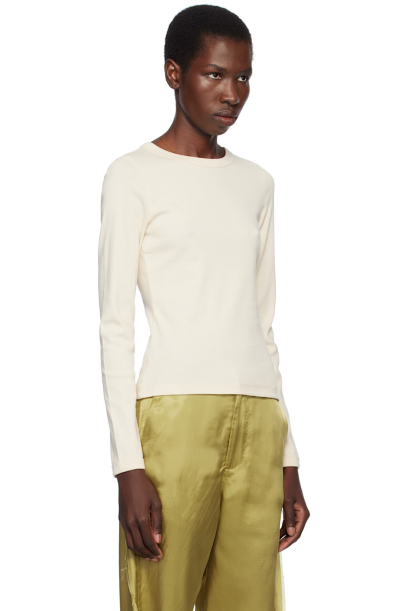 Organic cotton jersey T-shirt.

· Rib-knit crewneck and cuffs
· Central seam at back

Supplier color: Off white