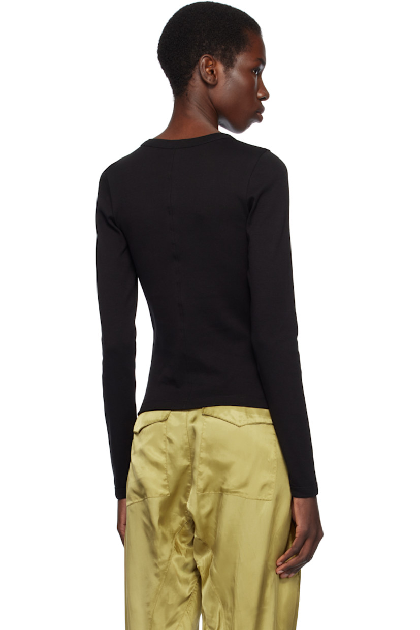Organic cotton jersey T-shirt.

· Rib-knit crewneck and cuffs
· Central seam at back

Supplier color: Black
