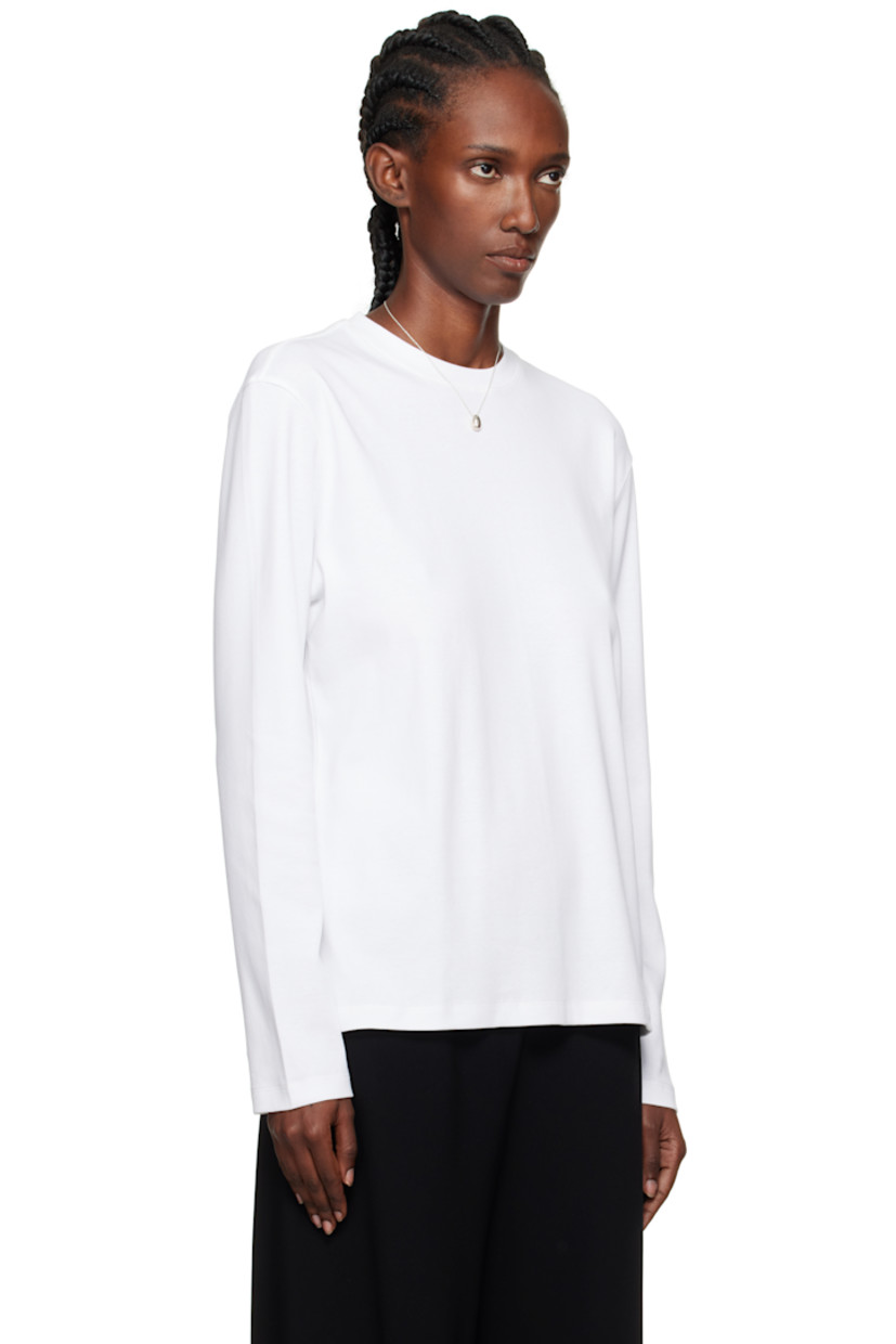 Rib-knit organic cotton T-shirt.

· Crewneck
· Dropped shoulders
· Central seam at back

Supplier color: White