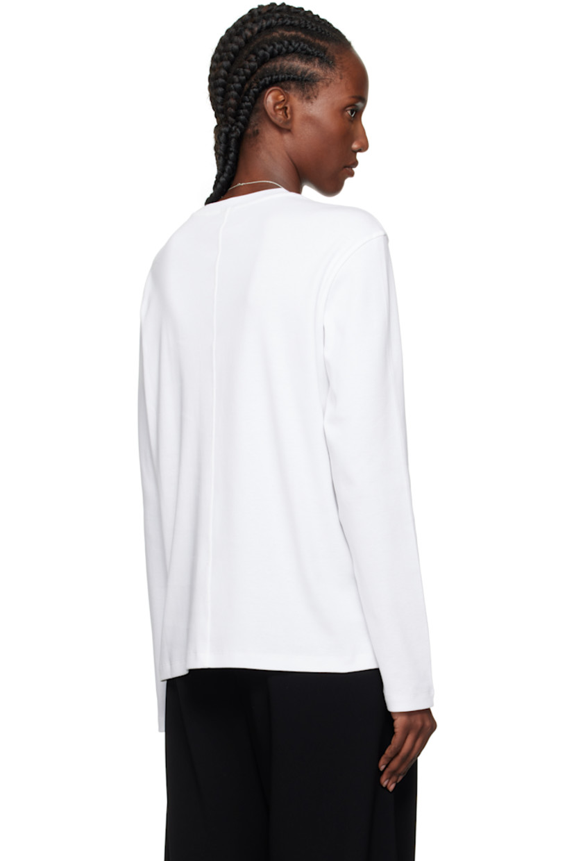 Rib-knit organic cotton T-shirt.

· Crewneck
· Dropped shoulders
· Central seam at back

Supplier color: White