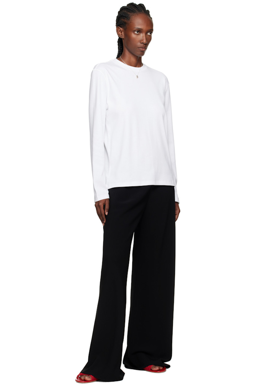 Rib-knit organic cotton T-shirt.

· Crewneck
· Dropped shoulders
· Central seam at back

Supplier color: White