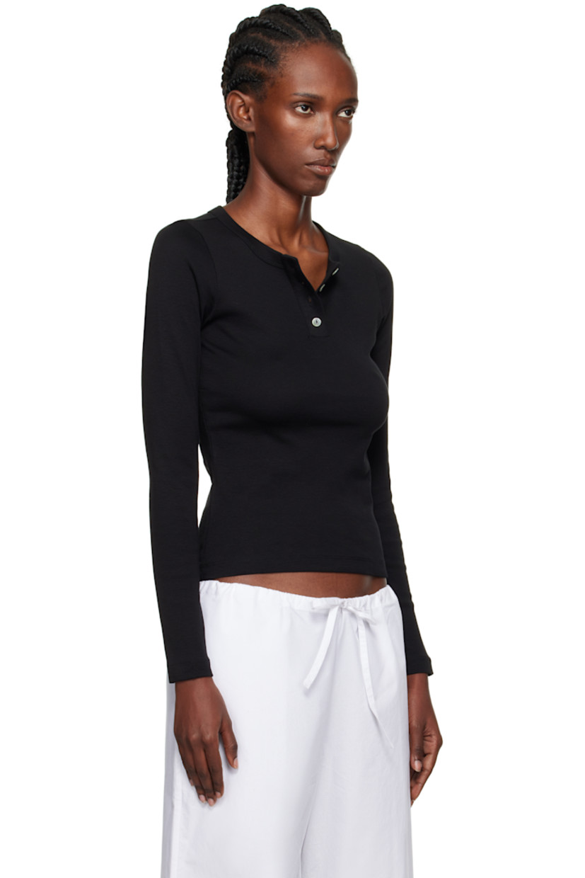 Rib-knit organic cotton T-shirt.

· Crewneck
· Four-button placket
· Central seam at back
· Mother-of-pearl hardware

Supplier color: Black
