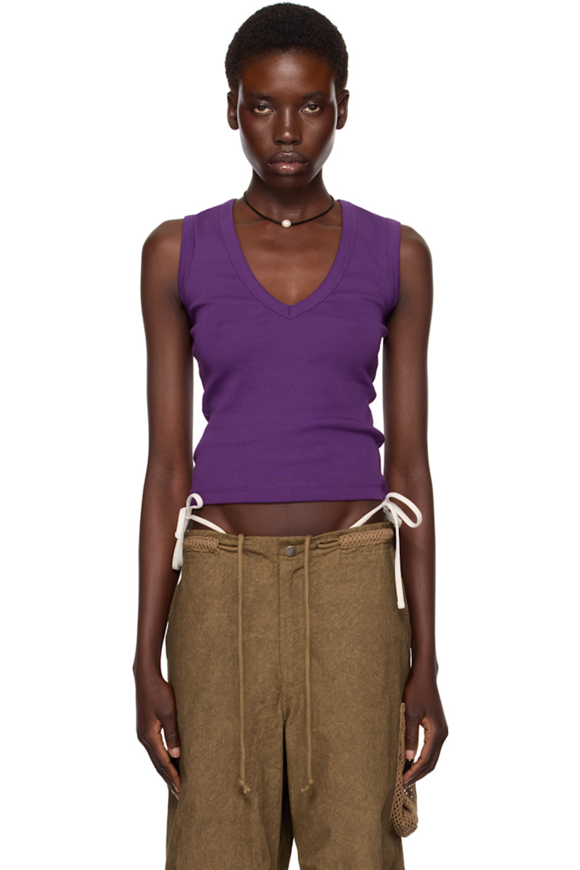 Organic cotton jersey tank top.

· Rib-knit plunging V-neck and armscyes
· Central seam at back

Part of the exclusive SSENSE HEAT capsule.

Supplier color: Imperial purple