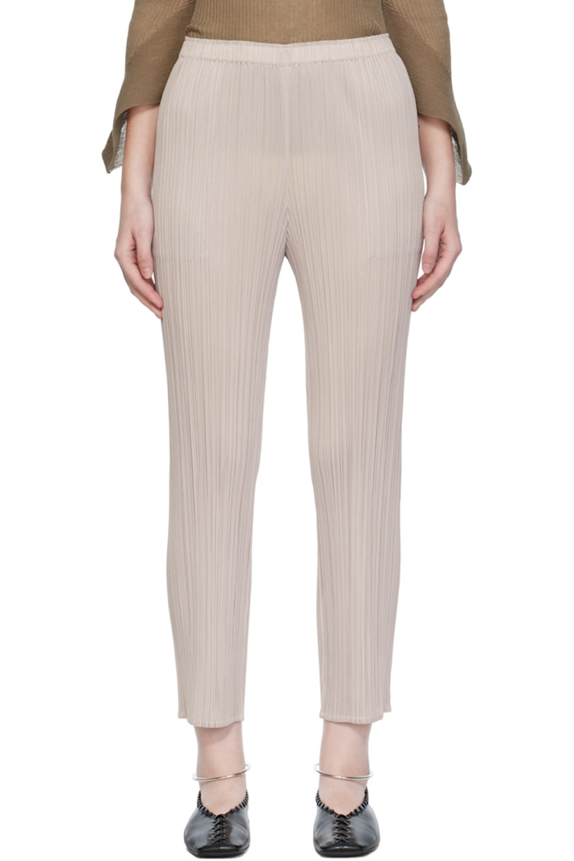 Garment-pleated tricot trousers.

· Straight-leg
· Elasticized waistband
· Two-pocket styling

Supplier color: Greige