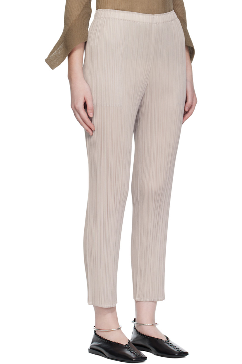 Garment-pleated tricot trousers.

· Straight-leg
· Elasticized waistband
· Two-pocket styling

Supplier color: Greige