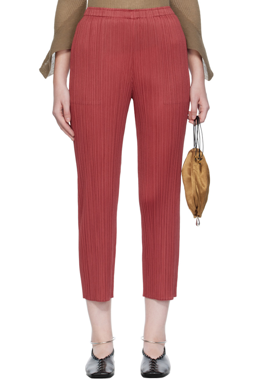 Garment-pleated tricot trousers. 

· Straight-leg
· Elasticized waistband
· Two-pocket styling
· Cropped legs

Supplier color: Dark red