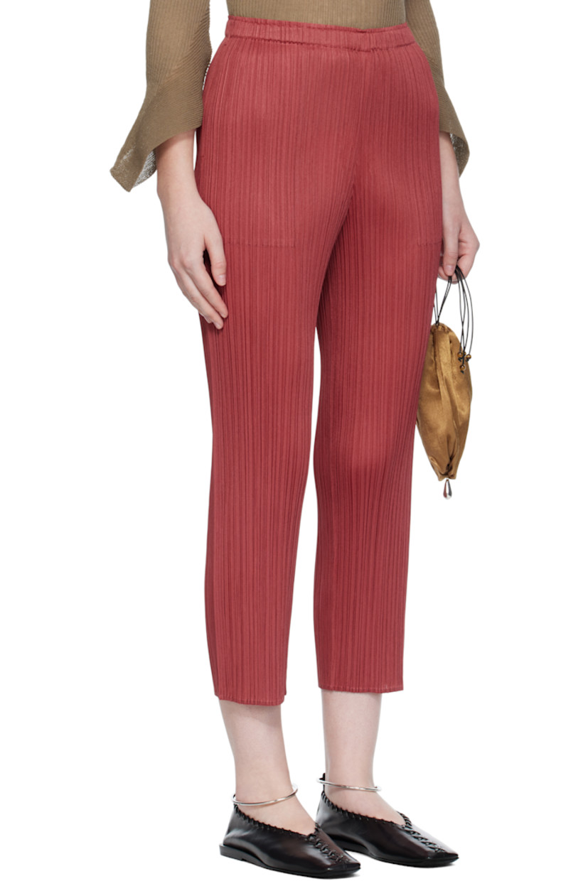 Garment-pleated tricot trousers. 

· Straight-leg
· Elasticized waistband
· Two-pocket styling
· Cropped legs

Supplier color: Dark red