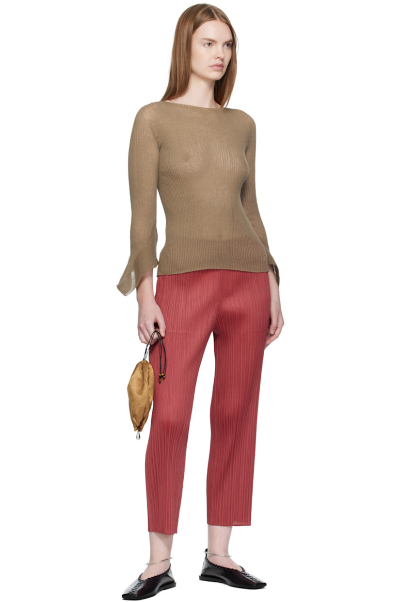Garment-pleated tricot trousers. 

· Straight-leg
· Elasticized waistband
· Two-pocket styling
· Cropped legs

Supplier color: Dark red
