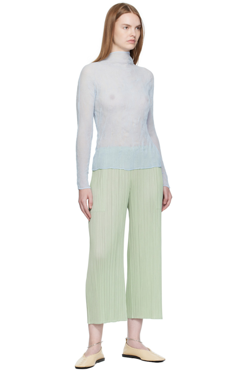 Garment-pleated tricot trousers. 

· Wide-leg
· Elasticized waistband
· Two-pocket styling
· Cropped legs

Supplier color: Pastel green