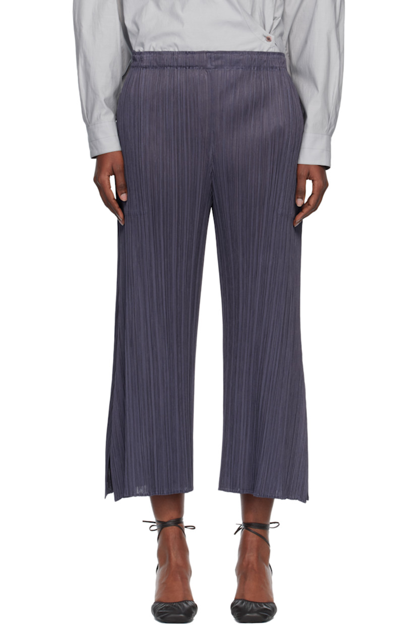 Garment-pleated tricot trousers.

· Straight-leg 
· Elasticized waistband
· Two-pocket styling
· Vented outseams 

Supplier color: Dark gray