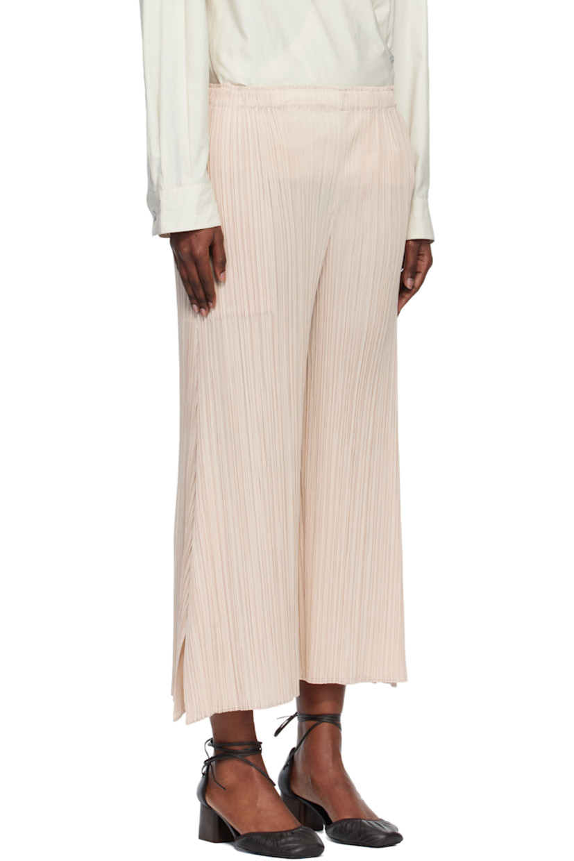 Garment-pleated tricot trousers.

· Straight-leg 
· Elasticized waistband
· Two-pocket styling

Supplier color: Light beige