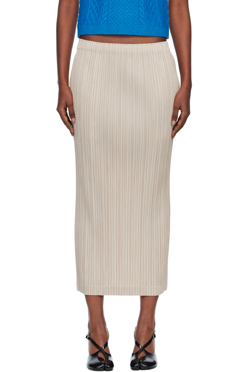 Garment-pleated tricot maxi skirt. 

· Elasticized waistband 
· Two-pocket styling

Supplier color: Greige