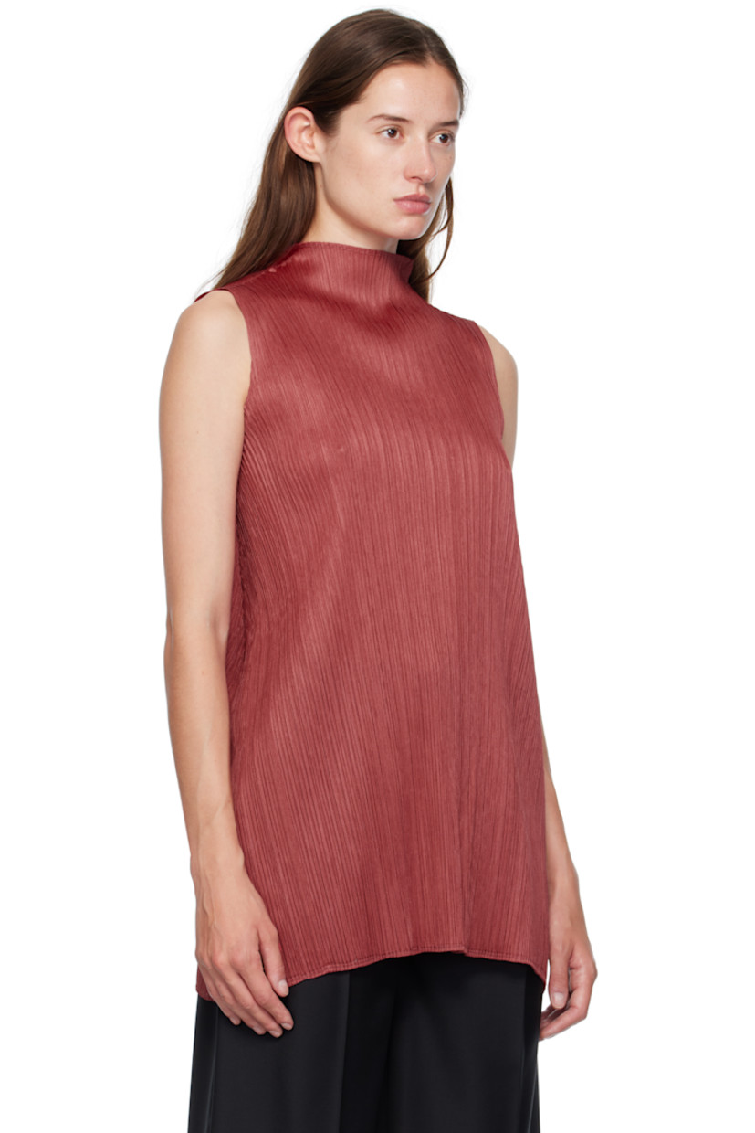 Garment-pleated tricot top. Mock neck.

Supplier color: Dark red