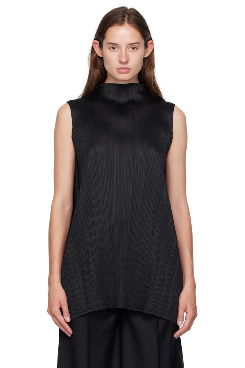Garment-pleated tricot top. Mock neck.

Supplier color: Black